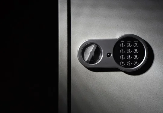 A safe door with a keypad on it